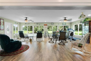 This stunning 3/2 MAGNOLIA single-family home is situated in the on Amberwood Executive Golf Course in Florida - for sale on GolfHomes.com, golf home, golf lot