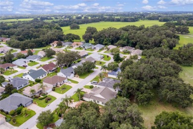 This stunning 3/2 MAGNOLIA single-family home is situated in the on Amberwood Executive Golf Course in Florida - for sale on GolfHomes.com, golf home, golf lot