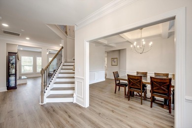 Experience timeless elegance and resort-style living in this on Mount Vintage Plantation and Golf Club  in South Carolina - for sale on GolfHomes.com, golf home, golf lot