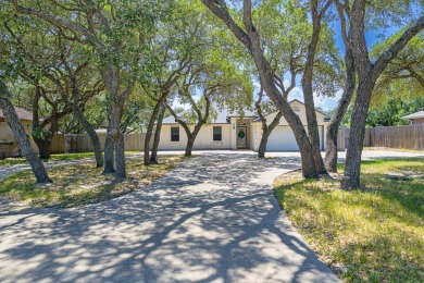 Experience the best of coastal living in this 4-bedroom, 2-bath on Rockport Country Club in Texas - for sale on GolfHomes.com, golf home, golf lot