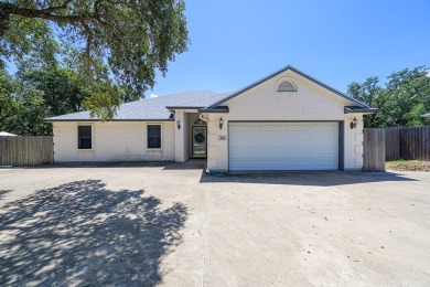 Experience the best of coastal living in this 4-bedroom, 2-bath on Rockport Country Club in Texas - for sale on GolfHomes.com, golf home, golf lot