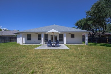 Experience the best of coastal living in this 4-bedroom, 2-bath on Rockport Country Club in Texas - for sale on GolfHomes.com, golf home, golf lot