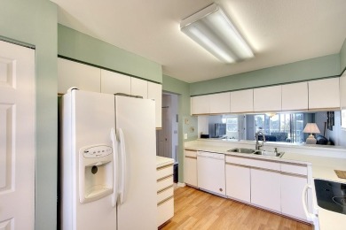 Enjoy stunning lake and golf course views from this lovely on Terra Ceia Golf and Country Club in Florida - for sale on GolfHomes.com, golf home, golf lot