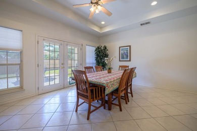 Experience the best of coastal living in this 4-bedroom, 2-bath on Rockport Country Club in Texas - for sale on GolfHomes.com, golf home, golf lot
