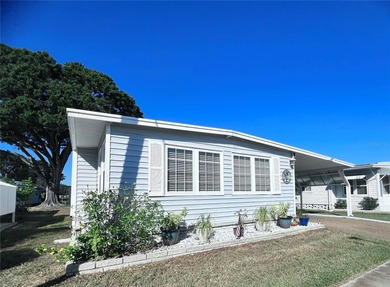 This charming home is truly in wonderful condition and has been on Fairway Village Golf Course in Florida - for sale on GolfHomes.com, golf home, golf lot