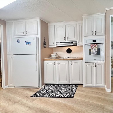 This charming home is truly in wonderful condition and has been on Fairway Village Golf Course in Florida - for sale on GolfHomes.com, golf home, golf lot