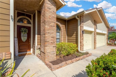 Welcome home to your tropical oasis, nestled in the highly on Countryway Golf Course in Florida - for sale on GolfHomes.com, golf home, golf lot