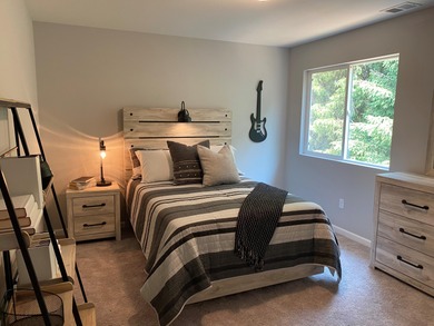This beautiful new townhome offers modern style and on Alwyn Downs Golf Club in Michigan - for sale on GolfHomes.com, golf home, golf lot