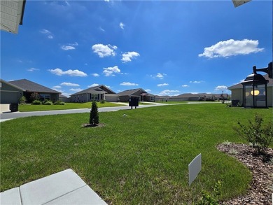 Live Where Others Vacation - Experience peaceful golf course on Twisted Oaks Golf Club in Florida - for sale on GolfHomes.com, golf home, golf lot