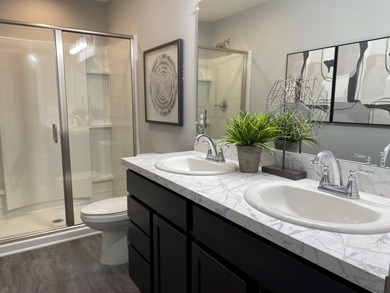 This beautiful new townhome offers modern style and on Alwyn Downs Golf Club in Michigan - for sale on GolfHomes.com, golf home, golf lot