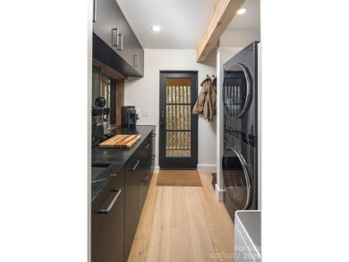 Stunning, Mountain-Modern Retreat in the Private, gated enclave on Connestee Falls Golf Club in North Carolina - for sale on GolfHomes.com, golf home, golf lot