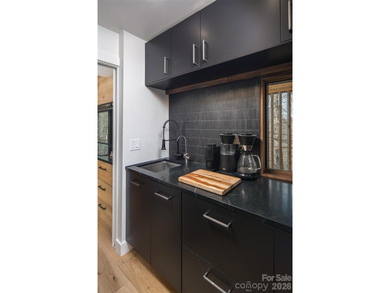 Stunning, Mountain-Modern Retreat in the Private, gated enclave on Connestee Falls Golf Club in North Carolina - for sale on GolfHomes.com, golf home, golf lot