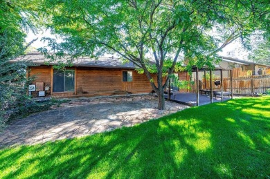 Spacious home in the Ridges near Redlands Mesa golf course on The Golf Club At Redlands Mesa in Colorado - for sale on GolfHomes.com, golf home, golf lot