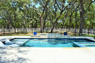 Estate living in the prestigious gated Horseshoe Bay equestrian on Ram Rock Golf Course in Texas - for sale on GolfHomes.com, golf home, golf lot