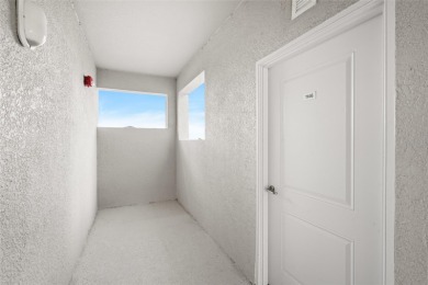 Experience unparalleled living in this exquisite top-floor on Heritage Landing Golf  in Florida - for sale on GolfHomes.com, golf home, golf lot