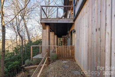 Stunning, Mountain-Modern Retreat in the Private, gated enclave on Connestee Falls Golf Club in North Carolina - for sale on GolfHomes.com, golf home, golf lot