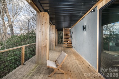 Stunning, Mountain-Modern Retreat in the Private, gated enclave on Connestee Falls Golf Club in North Carolina - for sale on GolfHomes.com, golf home, golf lot