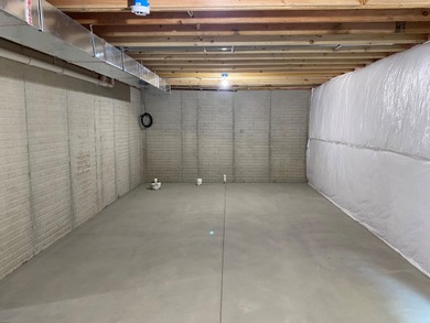This beautiful new townhome offers modern style and on Alwyn Downs Golf Club in Michigan - for sale on GolfHomes.com, golf home, golf lot