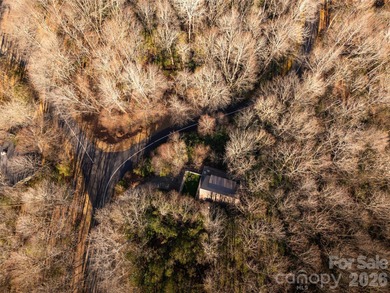 Stunning, Mountain-Modern Retreat in the Private, gated enclave on Connestee Falls Golf Club in North Carolina - for sale on GolfHomes.com, golf home, golf lot