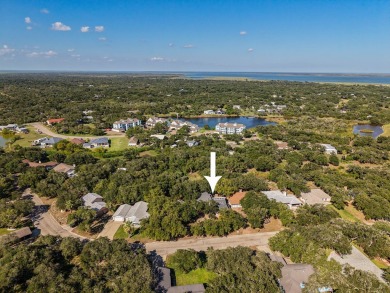 Lamar Peninsula Retreat under Majestic Coastal Oaks.  Nestled on Lamar Golf Course in Texas - for sale on GolfHomes.com, golf home, golf lot