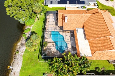 Gorgeous lake & golf views with stunning sunsets! Spacious 4BR on Bocaire Country Club in Florida - for sale on GolfHomes.com, golf home, golf lot