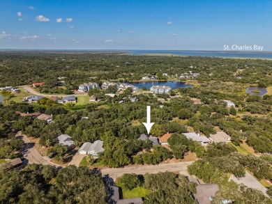 Lamar Peninsula Retreat under Majestic Coastal Oaks.  Nestled on Lamar Golf Course in Texas - for sale on GolfHomes.com, golf home, golf lot