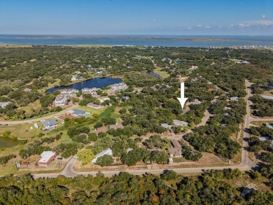 Lamar Peninsula Retreat under Majestic Coastal Oaks.  Nestled on Lamar Golf Course in Texas - for sale on GolfHomes.com, golf home, golf lot
