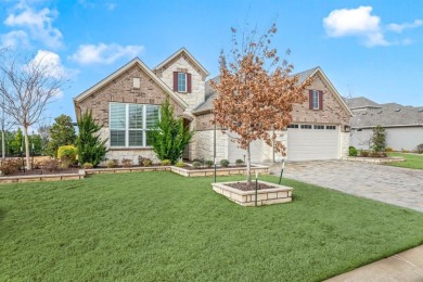Experience the height of luxury in this stunning Avalon home on Wildhorse Golf Club of Robson Ranch in Texas - for sale on GolfHomes.com, golf home, golf lot