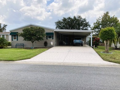 Nestled within the serene Crane Lakes Golf & Country Club, a on Crane Lakes Golf and Country Club in Florida - for sale on GolfHomes.com, golf home, golf lot