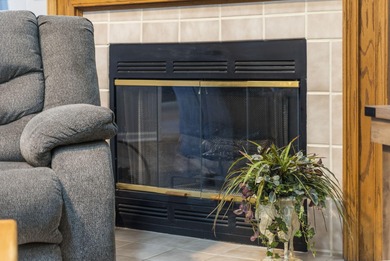 Penthouse condo with high vaulted ceilings and panoramic views on Pointe Royale Village Country Club in Missouri - for sale on GolfHomes.com, golf home, golf lot