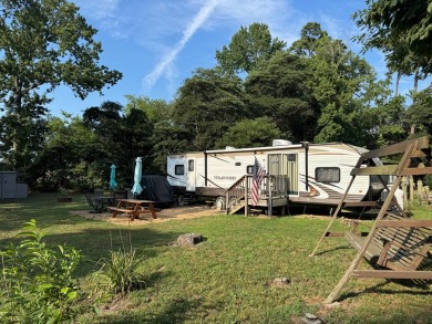Two lots, one camper. For sale are lots 33 & 34.  Nice on Captains Cove Golf and Yacht Club in Virginia - for sale on GolfHomes.com, golf home, golf lot