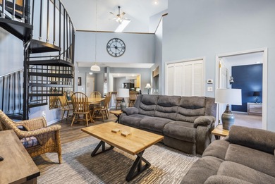 Penthouse condo with high vaulted ceilings and panoramic views on Pointe Royale Village Country Club in Missouri - for sale on GolfHomes.com, golf home, golf lot