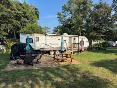 Two lots, one camper. For sale are lots 33 & 34.  Nice on Captains Cove Golf and Yacht Club in Virginia - for sale on GolfHomes.com, golf home, golf lot