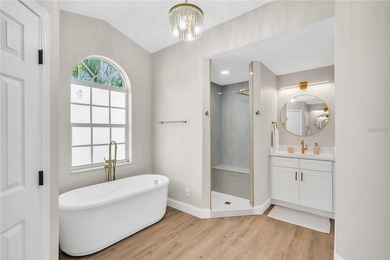 Step into this beautifully updated 3-bedroom, 2-bathroom home on Pinemoor West Golf Club in Florida - for sale on GolfHomes.com, golf home, golf lot