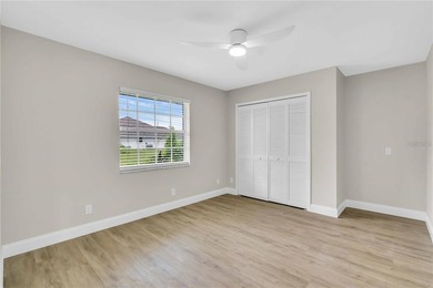 Step into this beautifully updated 3-bedroom, 2-bathroom home on Pinemoor West Golf Club in Florida - for sale on GolfHomes.com, golf home, golf lot