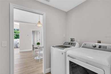 Step into this beautifully updated 3-bedroom, 2-bathroom home on Pinemoor West Golf Club in Florida - for sale on GolfHomes.com, golf home, golf lot