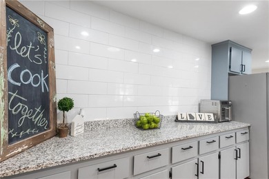 Set on a quiet street in the sought-after Horseshoe Bend on Horseshoe Bend Country Club in Georgia - for sale on GolfHomes.com, golf home, golf lot