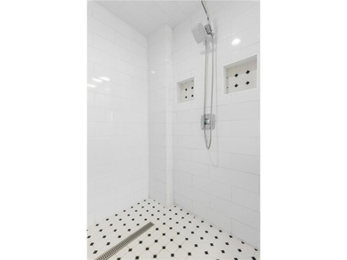 Set on a quiet street in the sought-after Horseshoe Bend on Horseshoe Bend Country Club in Georgia - for sale on GolfHomes.com, golf home, golf lot