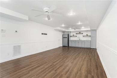 Set on a quiet street in the sought-after Horseshoe Bend on Horseshoe Bend Country Club in Georgia - for sale on GolfHomes.com, golf home, golf lot