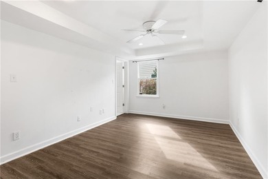 Set on a quiet street in the sought-after Horseshoe Bend on Horseshoe Bend Country Club in Georgia - for sale on GolfHomes.com, golf home, golf lot