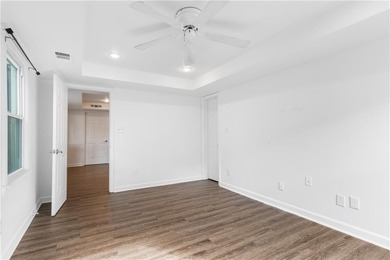 Set on a quiet street in the sought-after Horseshoe Bend on Horseshoe Bend Country Club in Georgia - for sale on GolfHomes.com, golf home, golf lot