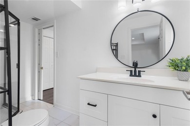 Set on a quiet street in the sought-after Horseshoe Bend on Horseshoe Bend Country Club in Georgia - for sale on GolfHomes.com, golf home, golf lot