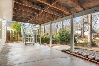 Set on a quiet street in the sought-after Horseshoe Bend on Horseshoe Bend Country Club in Georgia - for sale on GolfHomes.com, golf home, golf lot