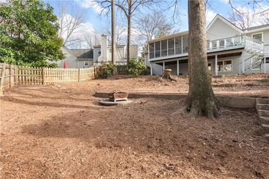 Set on a quiet street in the sought-after Horseshoe Bend on Horseshoe Bend Country Club in Georgia - for sale on GolfHomes.com, golf home, golf lot