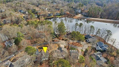 Set on a quiet street in the sought-after Horseshoe Bend on Horseshoe Bend Country Club in Georgia - for sale on GolfHomes.com, golf home, golf lot