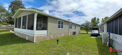 Come settle down and relax in a beautiful manufactured home with on Fairways Country Club in Florida - for sale on GolfHomes.com, golf home, golf lot