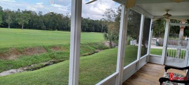 Come settle down and relax in a beautiful manufactured home with on Fairways Country Club in Florida - for sale on GolfHomes.com, golf home, golf lot