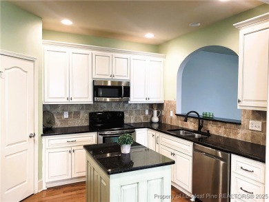 LOW MAINTENANCE LIVING CARRIAGE HOME IN GATED ANDERSON CREEK on Anderson Creek Golf Club in North Carolina - for sale on GolfHomes.com, golf home, golf lot