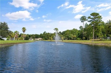 Discover an immaculate 5-bedroom, 3-bath lakefront home in on Laurel Island Links in Georgia - for sale on GolfHomes.com, golf home, golf lot