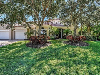 Fantastic golf & water views! 3BR/4BA+den w/extensive outdoor on Grand Harbor Golf and Country Club in Florida - for sale on GolfHomes.com, golf home, golf lot